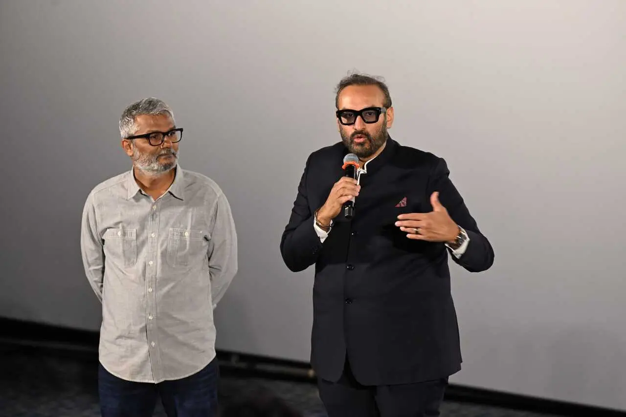 Producer Namit Malhotra, dressed in a traditional blue bandhgala suit, was seen addressing the audience.